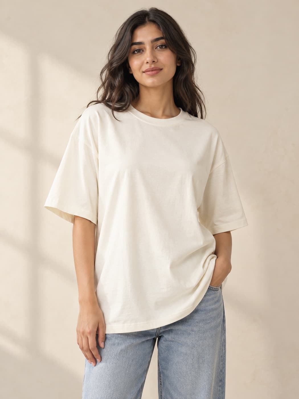Ivory oversized cotton T-shirt on a model